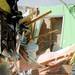 A toilet is seen as a backhoe demolishes the Cramer's bathroom in the Huron Farms subdivision in Dexter on Monday. Melanie Maxwell I AnnArbor.com